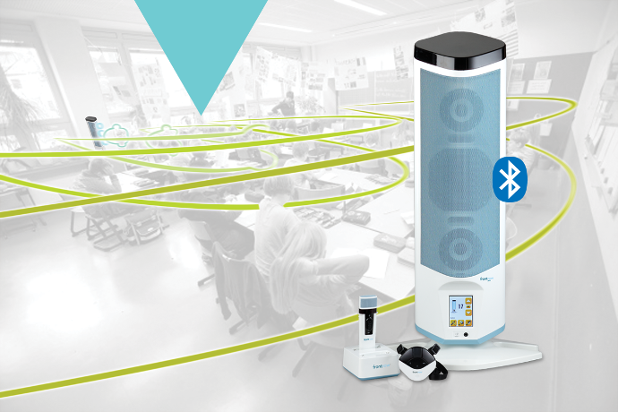 FrontRow Juno classroom audio system with microphone and Bluetooth connectivity, illustrating even sound coverage throughout a classroom.